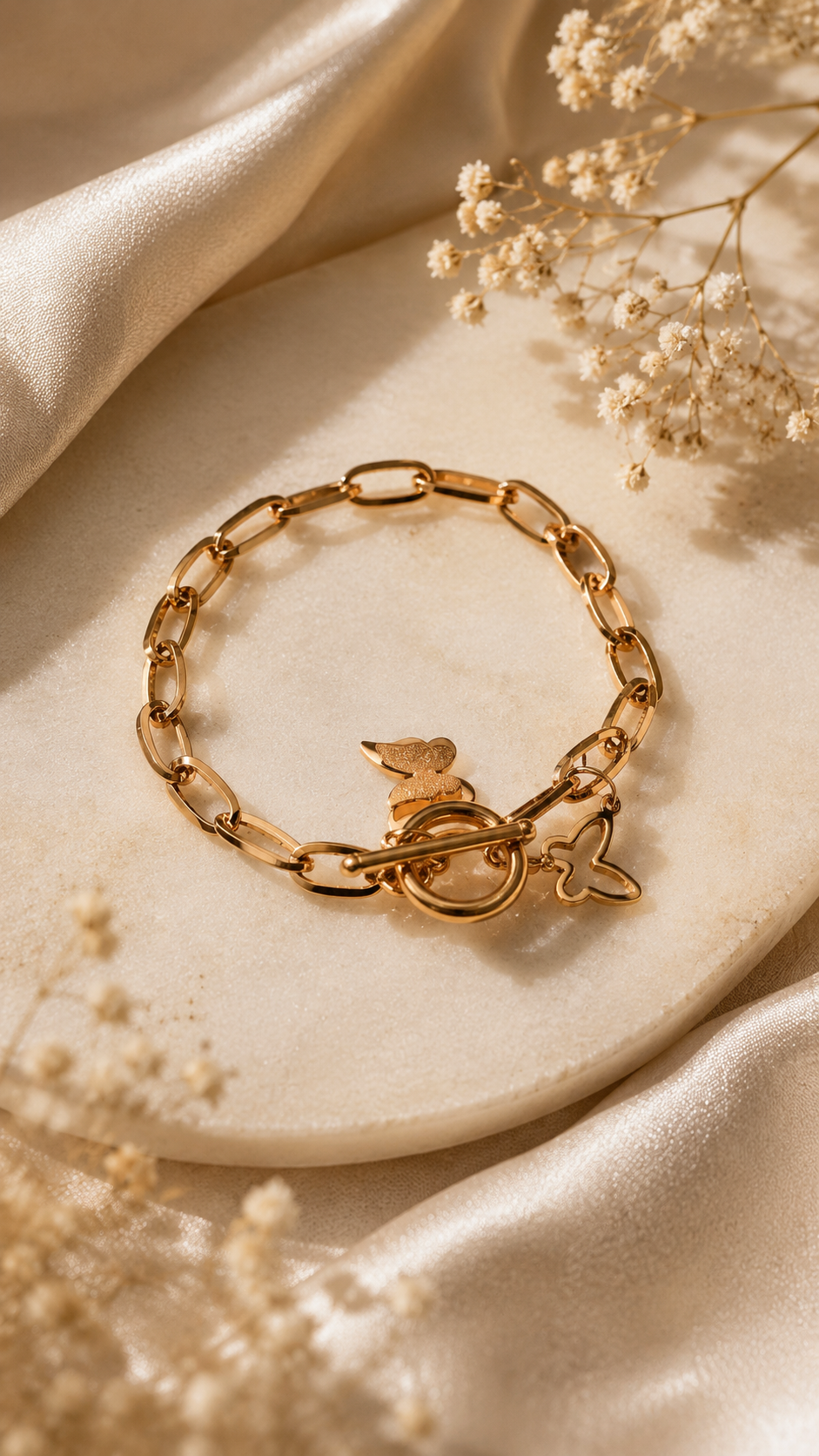 Gold bracelet styled on soft silk